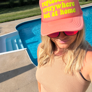 Replaceable Everywhere But at Home Trucker Hat